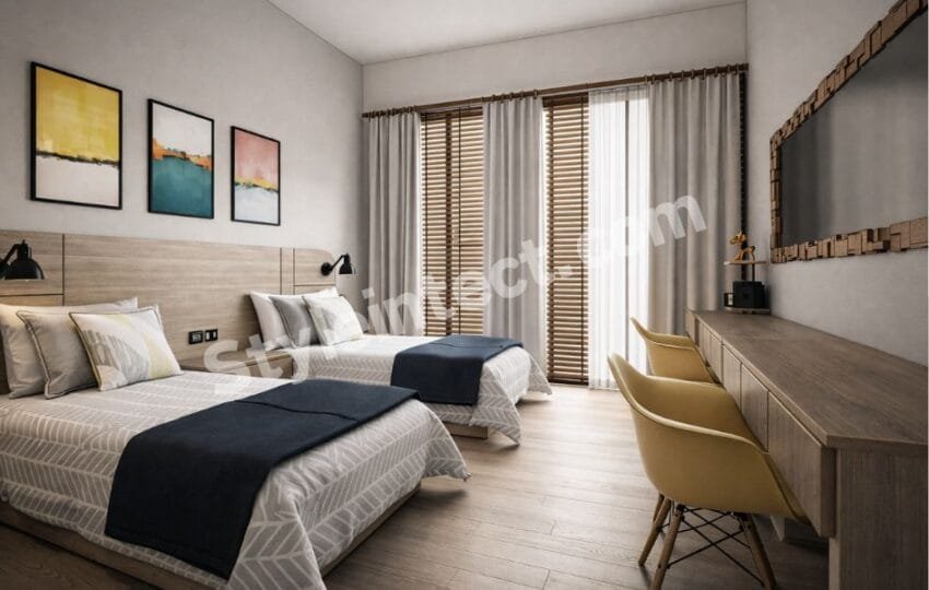Modern Twin Bedroom Interior Design with Smart Storage and Contemporary Wooden Finishes Create a Spacious and Functional Twin Bedroom Interior with a Minimalist Modern Theme This bedroom perfectly reflects a modern bedroom interior design that balances comfort, elegance, and functionality. Designed with two single beds, the room is ideal for siblings, guest rooms, hotels, or vacation homes. Soft neutral shades, warm wooden finishes, and clean lines create a relaxing atmosphere while maximizing usable space. Every design element contributes to a clutter-free, welcoming environment that feels both stylish and practical. Elegant Color Palette, Wooden Headboard, and Stylish Wall Décor for a Premium Look The room features a calming blend of white, beige, light oak, charcoal blue, and soft grey, creating a timeless interior. A continuous wooden headboard visually connects both beds, adding warmth and sophistication. Above it, modern abstract wall art introduces subtle color without overwhelming the space. This combination is widely used in luxury bedroom interior design because it keeps the room bright, elegant, and visually balanced. Smart Storage, Wardrobe Planning, and Practical Space Optimization Although the wardrobe is not visible in this image, the layout leaves ample wall space for a floor-to-ceiling modular wardrobe with sliding or hinged shutters, making it an ideal storage solution. The long floating console on the opposite wall provides additional concealed storage while functioning as a study or dressing area. This thoughtful planning demonstrates how space-saving bedroom furniture can improve organization without making the room feel crowded. Layered Lighting and Large Windows Enhance Comfort Throughout the Day Natural daylight flows through the large glass doors fitted with wooden blinds and sheer curtains, creating a bright yet private setting. Black wall-mounted reading lights beside each bed offer focused illumination, making nighttime reading convenient. The combination of natural lighting, task lighting, and ambient lighting enhances the overall comfort and creates a warm, inviting bedroom environment. Modern Furniture Layout Improves Daily Living and Multi-Purpose Use The twin-bed arrangement ensures smooth movement while maintaining privacy for each occupant. A long wooden console with comfortable chairs serves as a work desk, study station, or vanity, making the room highly versatile. The wooden flooring visually expands the room and complements the contemporary furniture, making this a perfect example of functional bedroom interior design for modern homes. Countries Where This Bedroom Interior Design Style Is Most Popular This contemporary bedroom style is widely preferred in India, Australia, the United States, Canada, Singapore, and the United Arab Emirates. Homeowners appreciate its efficient use of space, low-maintenance finishes, modern aesthetics, and flexibility for apartments, villas, boutique hotels, and guest accommodations. Why Choose StyleIntect? At StyleIntect.com, we create customized bedroom interiors that combine beauty with everyday functionality. Our experienced designers focus on smart layouts, premium materials, and personalized solutions tailored to your lifestyle. From concept planning to final execution, we deliver interiors that are elegant, durable, and designed to maximize every inch of your space. Our Services StyleIntect provides complete design solutions, including Architecture Design, Modular Kitchen Design, Interior Design, Revit 3D Design, Bathroom Design, Wardrobe Design, Commercial Design, and 2D Layout. Whether you are renovating a single bedroom or designing an entire property, our expert team transforms your ideas into modern, practical, and visually stunning living spaces.